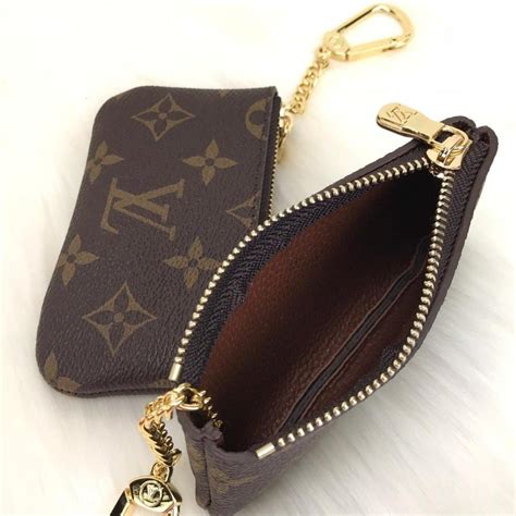 real louis vuitton coin pouch|louis vuitton coin case.